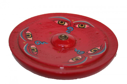 Tibet Incense burner. Handmade. Tibetan eye motif. Red background. At Tibet Spirit Store